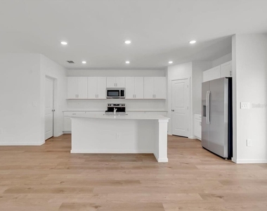 7349 Rainbow Bay Place - Photo Thumbnail 9