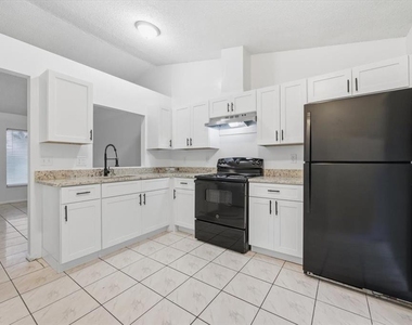 12214 Eastcove Drive - Photo Thumbnail 3