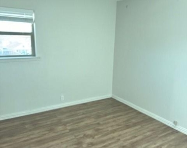 1003 S Houston Street - Photo Thumbnail 7