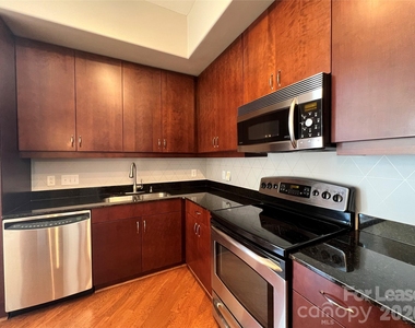4625 Piedmont Row Drive - Photo Thumbnail 1