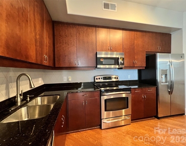 4625 Piedmont Row Drive - Photo Thumbnail 2