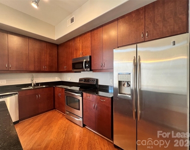 4625 Piedmont Row Drive - Photo Thumbnail 3