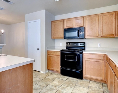 7421 Cowhand Court - Photo Thumbnail 7