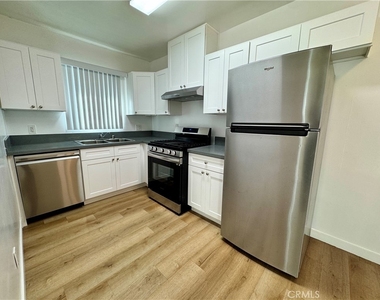 1114 N Mayfair - Photo Thumbnail 4