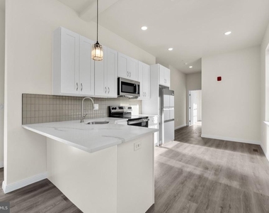 7513 Dicks Avenue - Photo Thumbnail 1