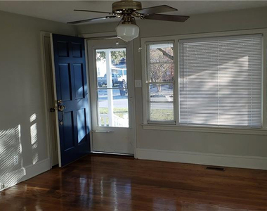 1011 E 10th Street - Photo Thumbnail 1