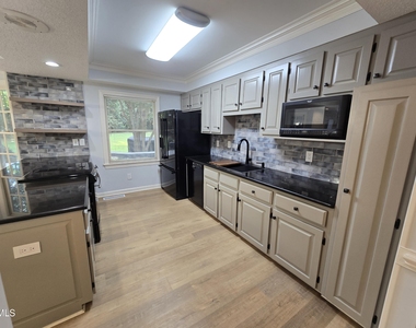 5516 Den Heider Way - Photo Thumbnail 30