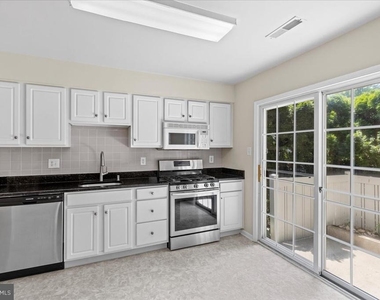1401 Delancey Way - Photo Thumbnail 6