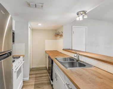 1813 Woodland Ave - Photo Thumbnail 6