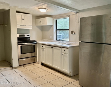 5213 Mcmanus Drive - Photo Thumbnail 4