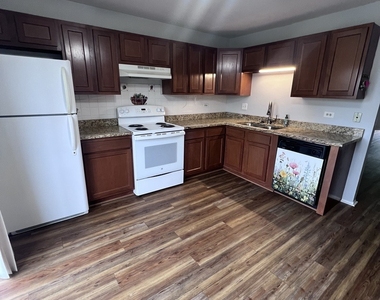 8238 Woodland Drive - Photo Thumbnail 2