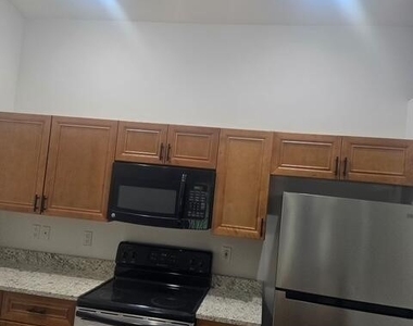 207 Se 23rd Place - Photo Thumbnail 3