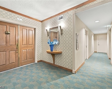 7515 Pelican Bay Boulevard - Photo Thumbnail 1