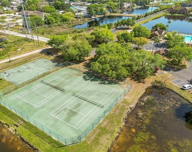 9158 Lake Chase Island Way - Photo Thumbnail 31
