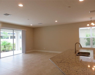 8813 Tropical Palm Drive - Photo Thumbnail 3