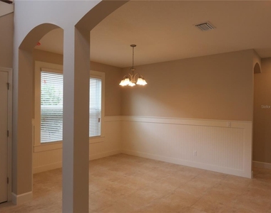 8813 Tropical Palm Drive - Photo Thumbnail 2