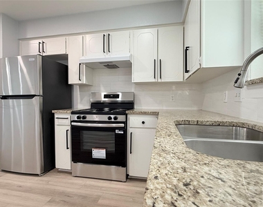 8001 Carrick Street - Photo Thumbnail 2