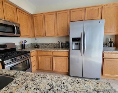 9560 Compass Point Drive S - Photo Thumbnail 13