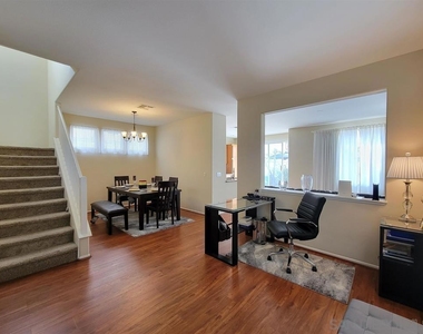 9560 Compass Point Drive S - Photo Thumbnail 4