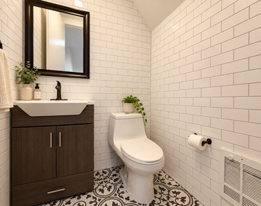 909 St Marks Place - Photo Thumbnail 4