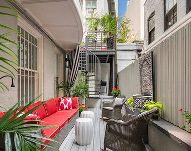 113 E 64th Street - Photo Thumbnail 3