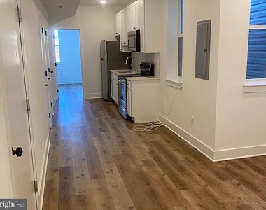1245 W Westmoreland Street - Photo Thumbnail 4