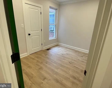 553 E Penn Street - Photo Thumbnail 2