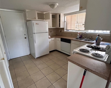 11114 W Bellfort Street - Photo Thumbnail 4