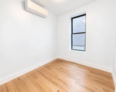 565 Saint Johns Pl - Photo Thumbnail 1