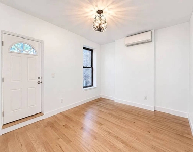 565 Saint Johns Pl - Photo Thumbnail 2