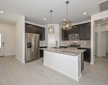 14203 W Voltaire Street - Photo Thumbnail 3