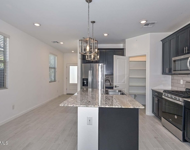 14203 W Voltaire Street - Photo Thumbnail 4