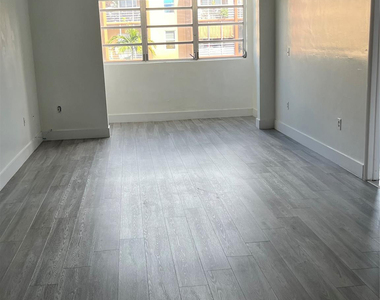 6070 W 19 Avenue - Photo Thumbnail 1