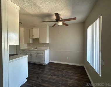 1259 E Ohio Ave - Photo Thumbnail 5
