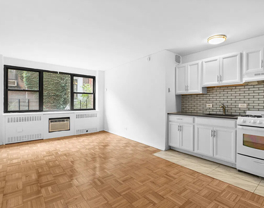 110 E 36th Street - Photo Thumbnail 1