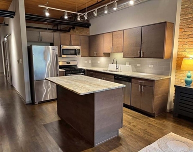 445 E Illinois Street - Photo Thumbnail 2