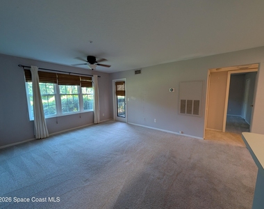 7667 N Wickham Road - Photo Thumbnail 3