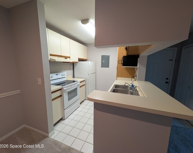 7667 N Wickham Road - Photo Thumbnail 6