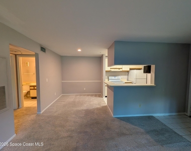 7667 N Wickham Road - Photo Thumbnail 4