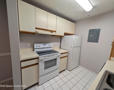 7667 N Wickham Road - Photo Thumbnail 7