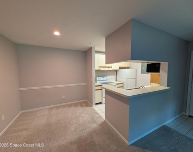 7667 N Wickham Road - Photo Thumbnail 5