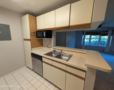 7667 N Wickham Road - Photo Thumbnail 8