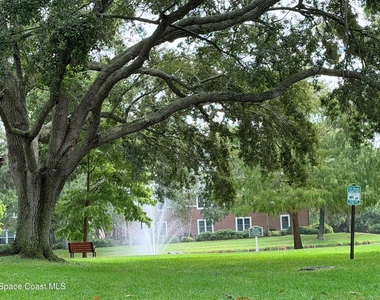 7667 N Wickham Road - Photo Thumbnail 2