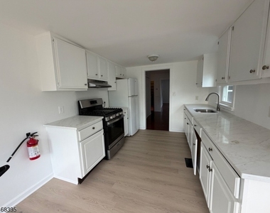58 N Main St - Photo Thumbnail 3