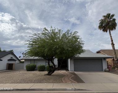 10734 N 108th Place - Photo Thumbnail 1