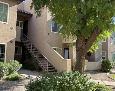 9450 E Becker Lane - Photo Thumbnail 1