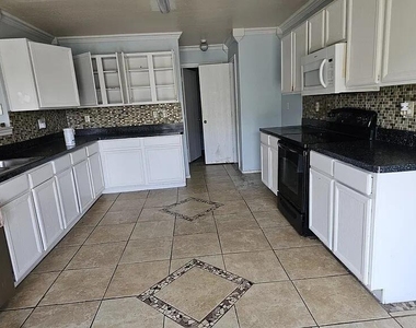 702 Locustberry Drive - Photo Thumbnail 6