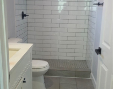 928 E 57th - Photo Thumbnail 5