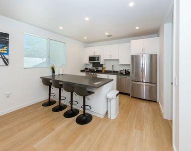 5992 Sawyer Street - Photo Thumbnail 4