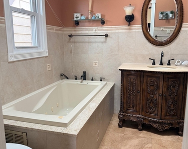 159-51 95th Ave - Photo Thumbnail 1